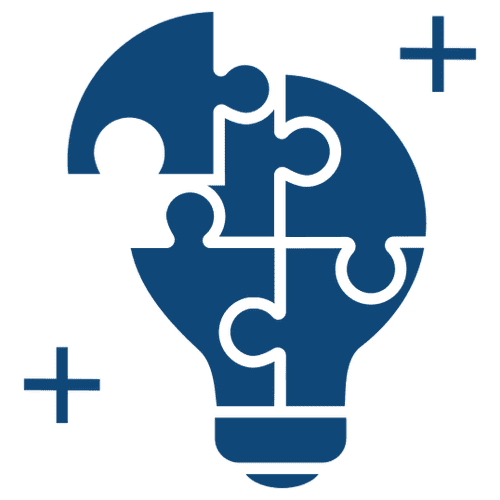 A blue puzzle piece light bulb with different colored pieces missing.
